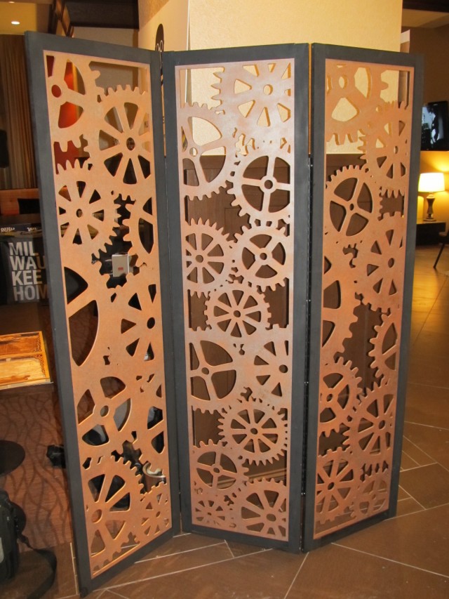 A 6 foot tall, clockwork gear inpired, tri-fold room divider